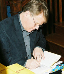 Robert Scoble autographing Naked Conversations at the launch party